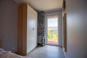 Posteľ alebo postele v izbe v ubytovaní Apartament dla aktywnych (z pięknym widokiem)