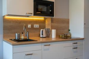 Kuchyňa alebo kuchynka v ubytovaní Apartament dla aktywnych (z pięknym widokiem) + 34 fotografií