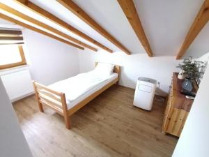 Postel nebo postele na pokoji v ubytování Rooms Delux Sarajevo