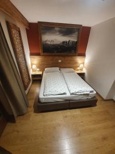 Postel nebo postele na pokoji v ubytování Garni Eden Bed and breakfast
