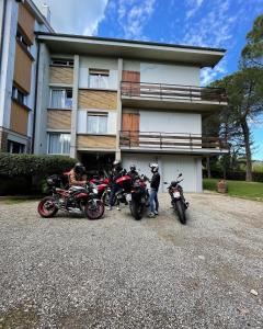 a group of motorcycles parked in front of a building at BASISA Bed&Breakfast in San Lazzaro di Savena