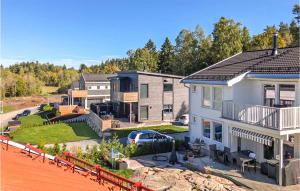 arial view of a house with a yard at Nice Home In Nordre Frogn With Wifi And 5 Bedrooms in Nordre Frogn