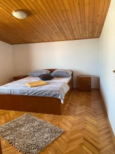 Postel nebo postele na pokoji v ubytování Apartment Meri