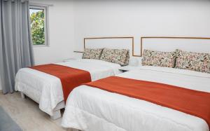 Postel nebo postele na pokoji v ubytování Saman Residence