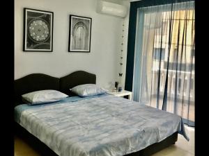 Postel nebo postele na pokoji v ubytování DK Apartmani