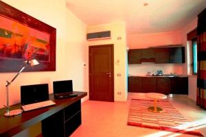 TV a/nebo společenská místnost v ubytování Hotel Massimino