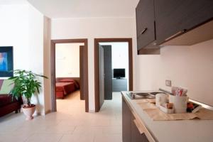Kuchyň nebo kuchyňský kout v ubytování Hotel Massimino