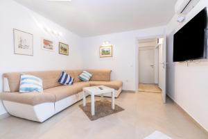 TV a/nebo společenská místnost v ubytování Apartman Lea