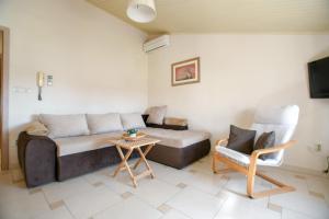 Posezení v ubytování Apartments Deak