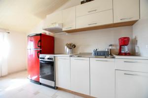 Kuchyň nebo kuchyňský kout v ubytování Apartments Deak