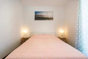Posteľ alebo postele v izbe v ubytovaní Golden Island Apartments