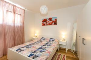 Posteľ alebo postele v izbe v ubytovaní Golden Island Apartments