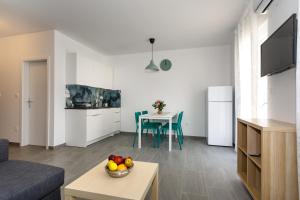 Kuchyňa alebo kuchynka v ubytovaní Golden Island Apartments