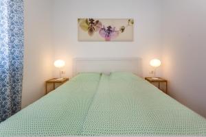 Posteľ alebo postele v izbe v ubytovaní Golden Island Apartments