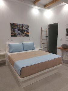 Ein Bett oder Betten in einem Zimmer der Unterkunft Elite Suites Naxos