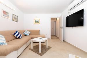 TV a/nebo společenská místnost v ubytování Apartman Lea