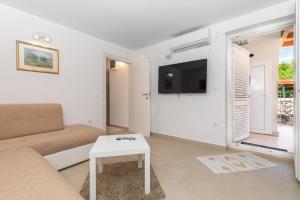 TV a/nebo společenská místnost v ubytování Apartman Lea
