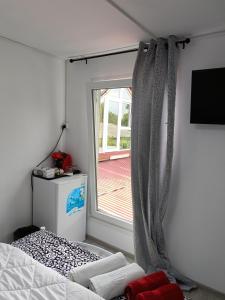 Postel nebo postele na pokoji v ubytování AMBIENT Geavidan 2