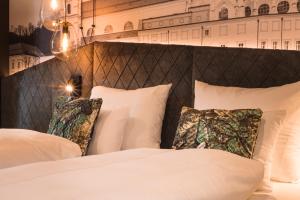 Uma cama ou camas num quarto em Am Paulusbogen