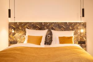 Uma cama ou camas num quarto em Am Paulusbogen
