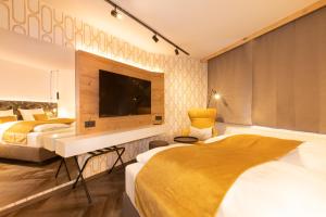 Uma cama ou camas num quarto em Am Paulusbogen