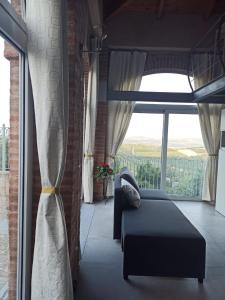 A bed or beds in a room at La gemella