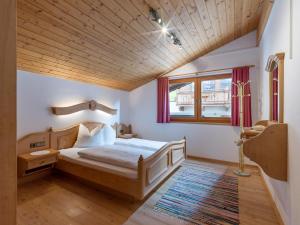 Tempat tidur dalam kamar di Eden Appartements