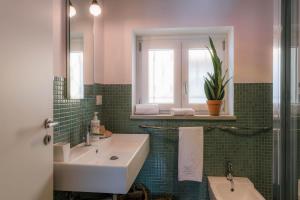 Koupelna v ubytování Casa delle sirene + 57 fotografií