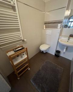 Kylpyhuone majoituspaikassa Kovarik Apartments I