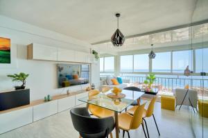Posedenie v ubytovaní Luxy Beach Apartment