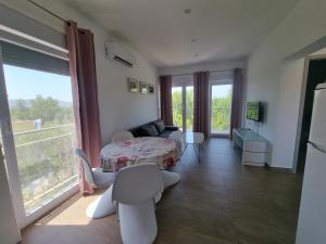 Postel nebo postele na pokoji v ubytování Apartmani Jozic