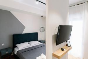 Un televizor și/sau centru de divertisment la Stamatina's Luxury Apartment (Little Suite)