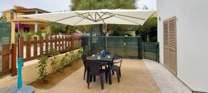 A patio or other outdoor area at Appartamento Brigida Bilocale 3 posti vicino al centro