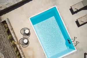 The swimming pool at or close to Niva Pool Suites