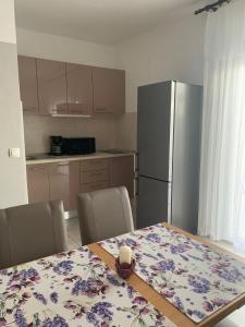 Kuchyňa alebo kuchynka v ubytovaní Apartment Jure