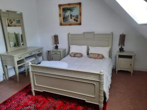Postel nebo postele na pokoji v ubytování Killenard Self Catering Accommodation