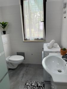 Koupelna v ubytování Apartment Greta