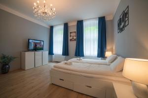 Postel nebo postele na pokoji v ubytování Top class apartments in Carlsbad