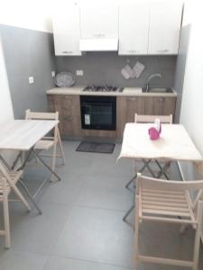 A kitchen or kitchenette at L'Albero bello Holiday