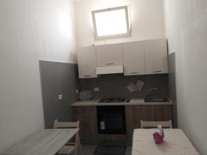 A kitchen or kitchenette at L'Albero bello Holiday