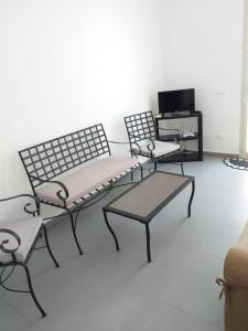 A seating area at L'Albero bello Holiday