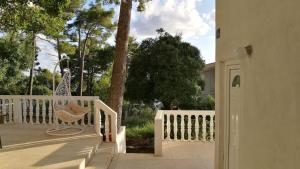 En balkon eller terrasse på House in the pines