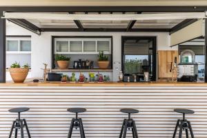 The lounge or bar area at Panormos Beach Hotel Skopelos