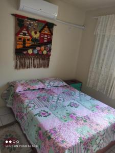 Posteľ alebo postele v izbe v ubytovaní Apartamento da Fô