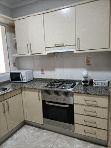 A kitchen or kitchenette at UIM Mediterraneo PB America Wifi