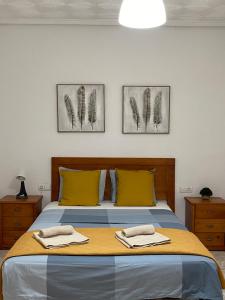 A bed or beds in a room at UIM Mediterraneo PB America Wifi
