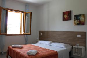 Cama o camas de una habitación en Binja Fortuna
