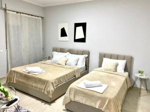 Postel nebo postele na pokoji v ubytování Chlo apartment 1 Tirane