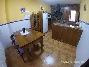 
A kitchen or kitchenette at Casa Xuaquin
