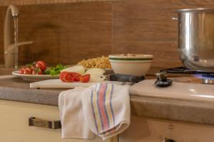 a kitchen counter with a plate of food on a counter top at Casa Vacanze 'Zia Lucia' in Sarconi